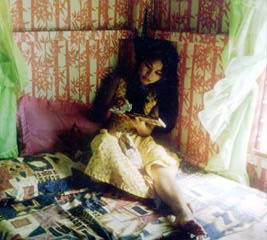 Photo of Emelda in her bedroom